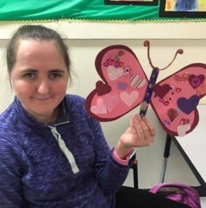 Activities for Adults with Disabilities - Participant with Butterfly craft